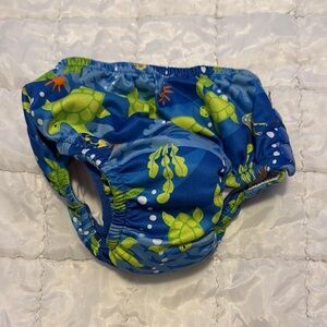 Vibrant Blue and Green Frog Diaper Swim with Secure Fit